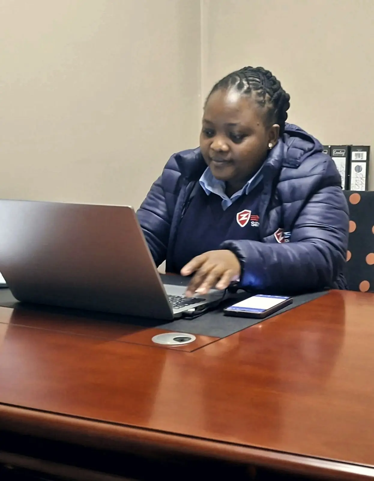 ZENOSC administrator at a laptop